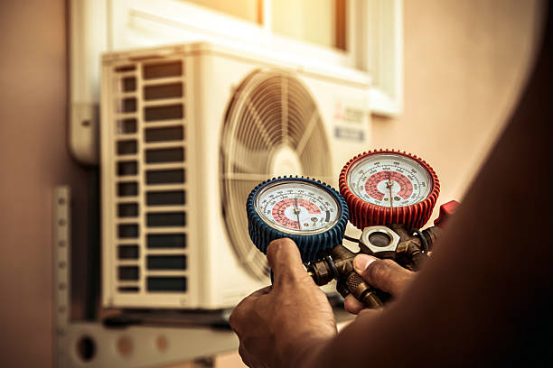 Professional Ac Installation technician working in Roggen, CO